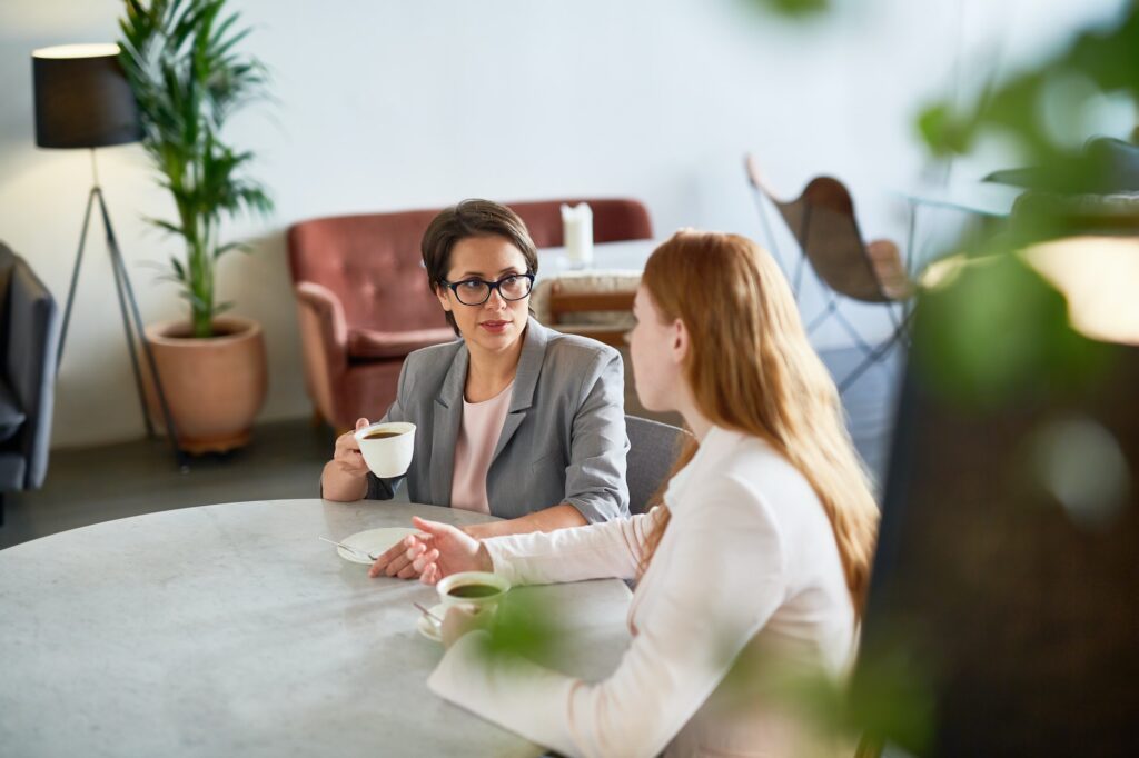 Women talking in cafe